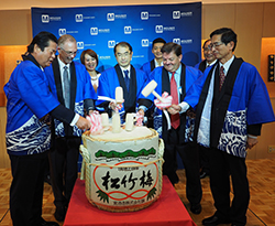 Mouser Electronics opens its new Customer Service Center in Tokyo with a traditional Japanese Kagamiwari Ceremony. Pictured from left are Mouser executives and guests: Junshi Yamaguchi, NXP Chairman; Glenn Smith, Mouser President and CEO; Tsuneyuki Kato, Executive VP of Jetro; Mark Burr-Lonnon, Mouser Sr. VP of APAC & EMEA; Minoru Okamoto, TE Senior Advisor to CEO/Chairman. Pictured in back are Daphne Tien, Mouser APAC Director of Business Development/Marketing; Ho-Pin Tung, Professional Racecar Driver and Toshiyuki Yanagida, Mouser Chief Representative in Japan.